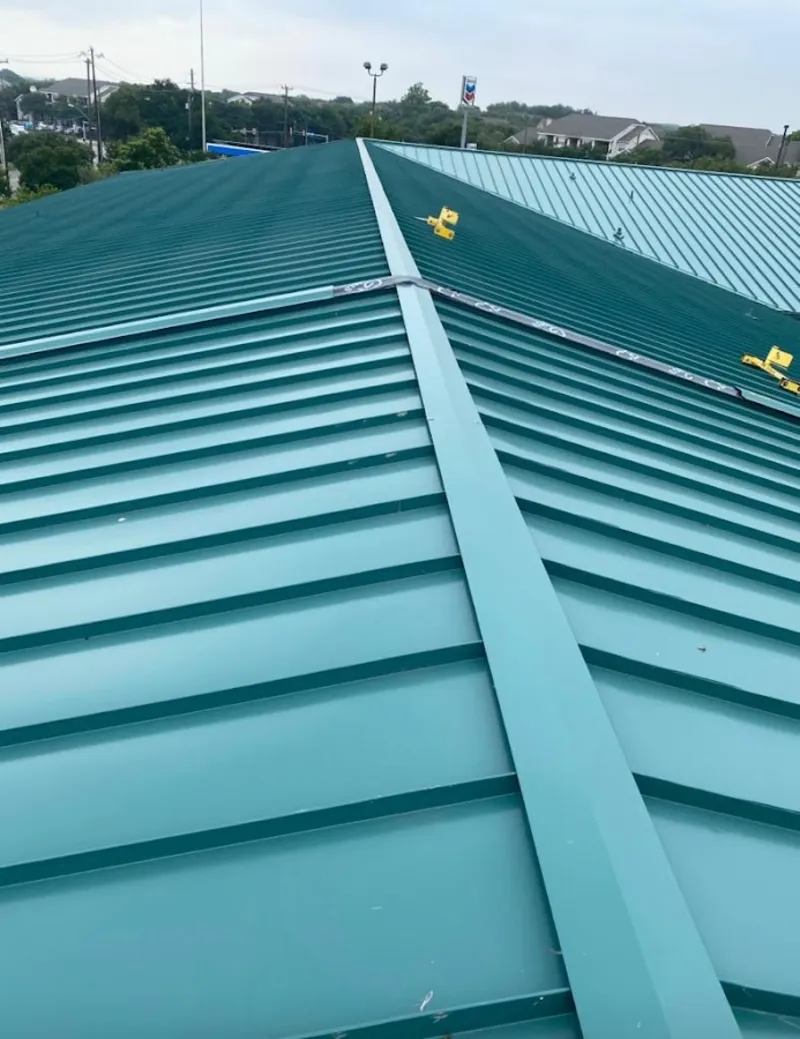 Green commercial metal roof ridge and valley for Metal Roof Repair in Calumet