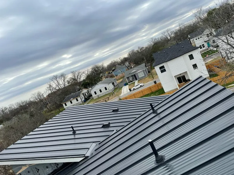 Standing seam metal roof panels with vents for Skylight Repair in Calumet